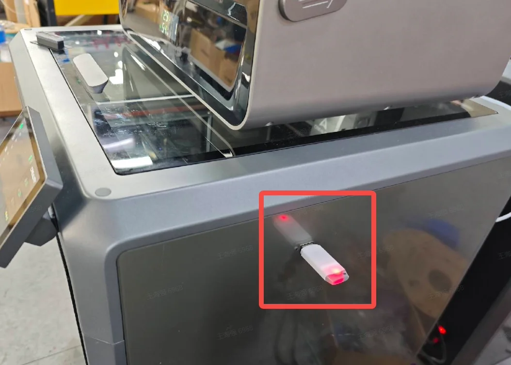 Insert the USB drive into the printer